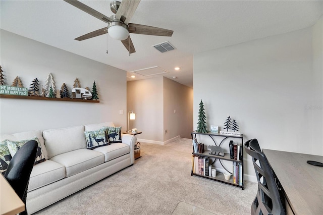 living room with ceiling fan and light colored carpet