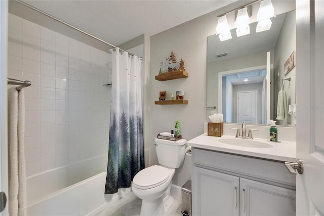 full bathroom featuring toilet, vanity, and shower / bath combination with curtain