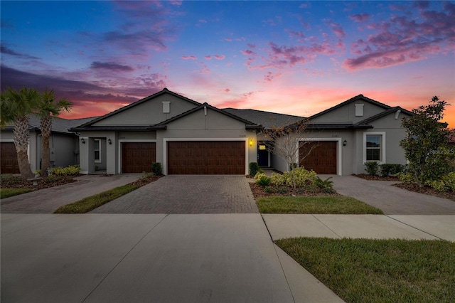 ranch-style house featuring a garage