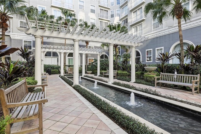 surrounding community featuring a pergola