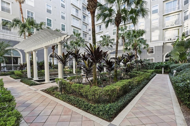 view of property's community with a pergola