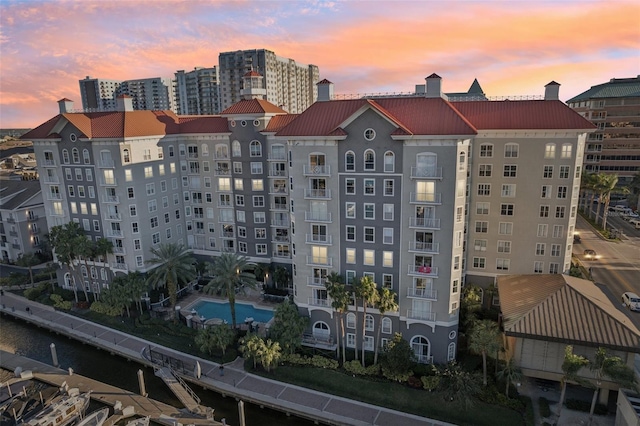 view of outdoor building at dusk