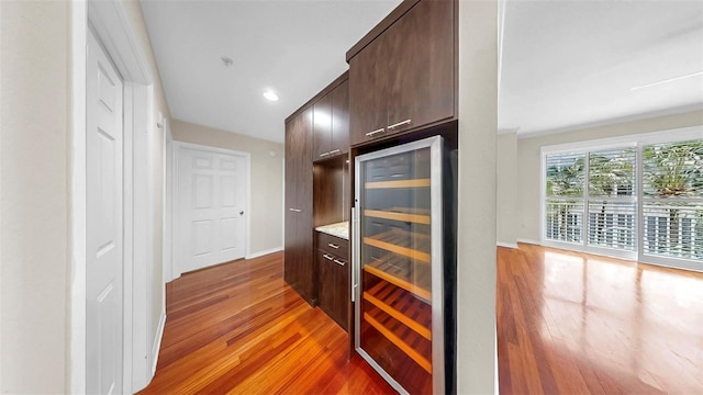 700 S Harbour Island Blvd Unit 226, Tampa, FL 33602 - bar area with wine cooler, light wood-style floors, baseboards, and recessed lighting