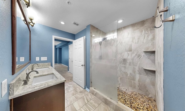 700 S Harbour Island Blvd Unit 226, Tampa, FL 33602 - bathroom with a walk in shower, double vanity, marble finish floors, and recessed lighting