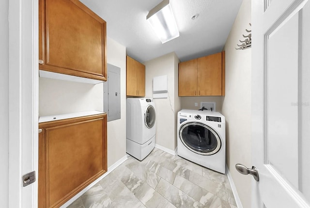 700 S Harbour Island Blvd Unit 226, Tampa, FL 33602 - washroom with cabinet space, light marble finish flooring, washing machine and dryer, electric panel, and baseboards