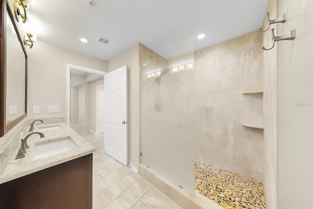 700 S Harbour Island Blvd Unit 226, Tampa, FL 33602 - bathroom featuring a walk in shower, double vanity, recessed lighting, and tile patterned flooring