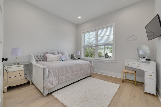 bedroom featuring light hardwood / wood-style floors