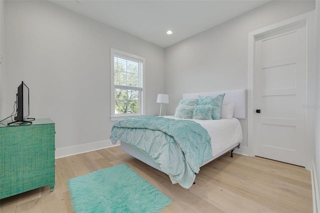 bedroom featuring light wood-type flooring