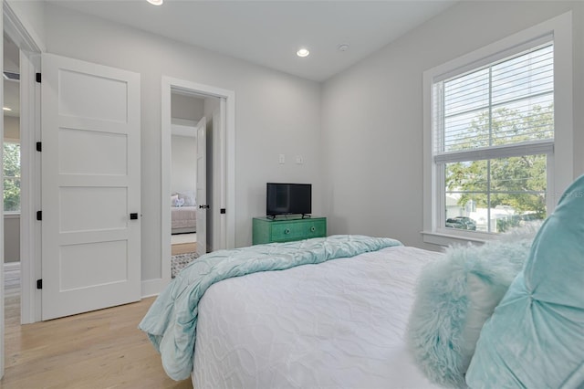 bedroom featuring light hardwood / wood-style flooring