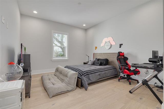 bedroom featuring light hardwood / wood-style floors