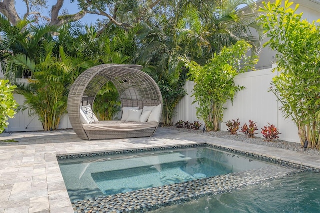 view of swimming pool with a patio