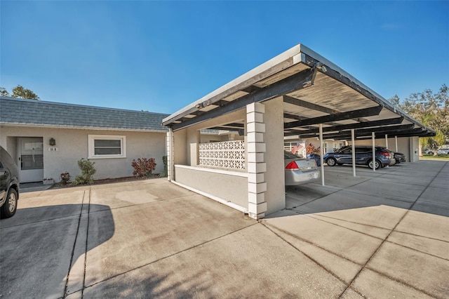 exterior space featuring a carport