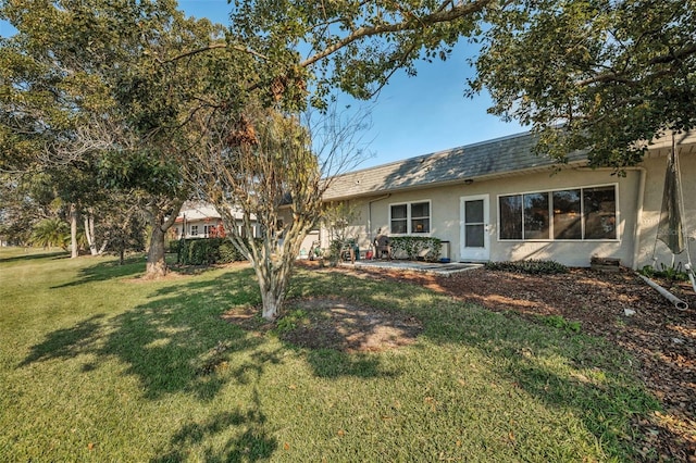 exterior space featuring a lawn