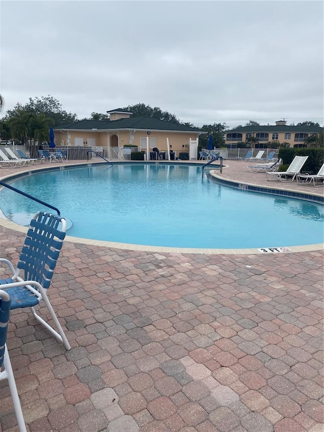 view of pool featuring a patio area