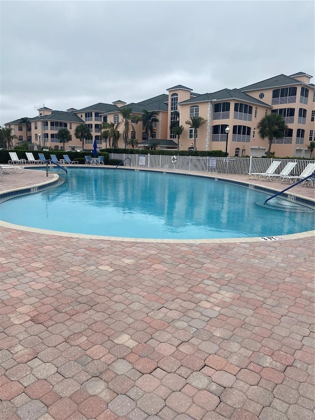 view of swimming pool featuring a patio