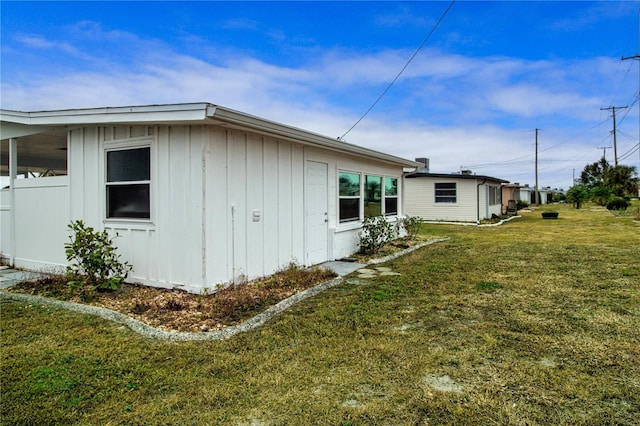 view of property exterior featuring a yard