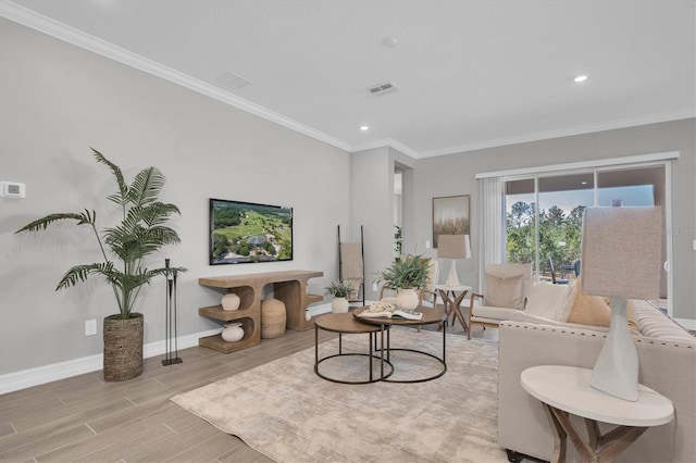 living room with ornamental molding