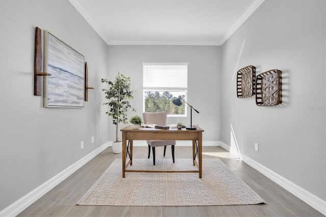 office with wood-type flooring and ornamental molding