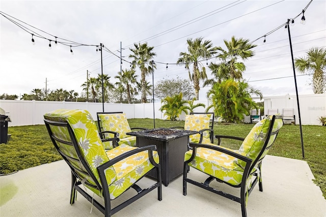 view of patio featuring an outdoor fire pit