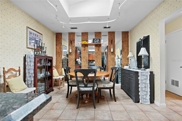 dining area with light tile patterned floors