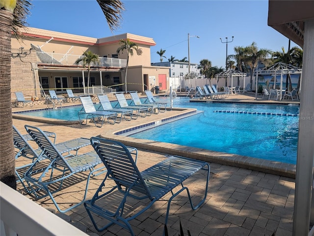 view of pool with a patio area