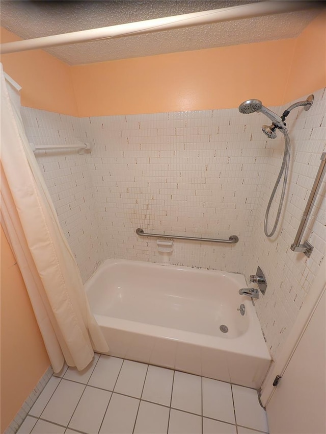 bathroom featuring tile patterned flooring and shower / tub combo with curtain