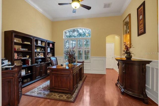 office space with ceiling fan, wood-type flooring, and crown molding