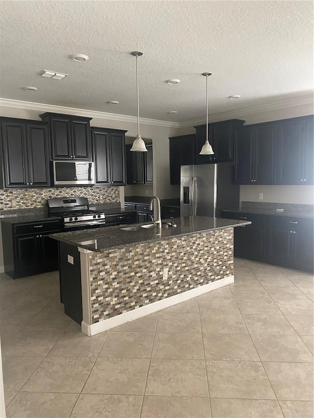 kitchen with appliances with stainless steel finishes, dark cabinets, and ornamental molding