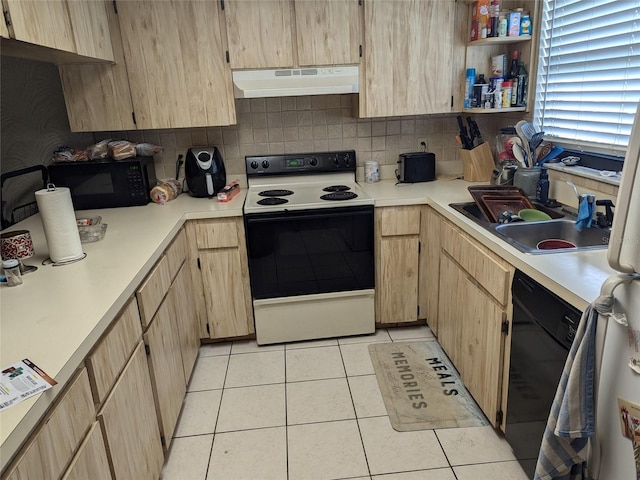 kitchen with tasteful backsplash, sink, black appliances, light brown cabinets, and light tile patterned floors