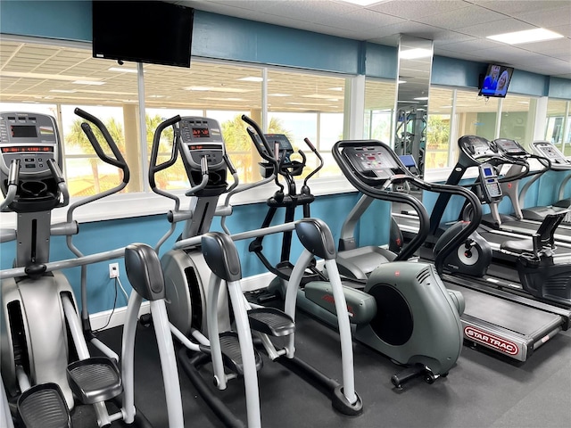 gym featuring a drop ceiling