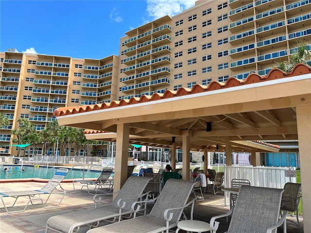 view of patio featuring a community pool