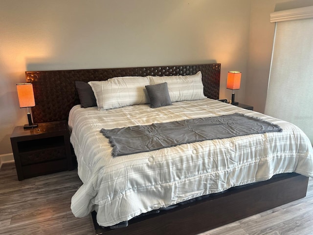 bedroom featuring hardwood / wood-style floors