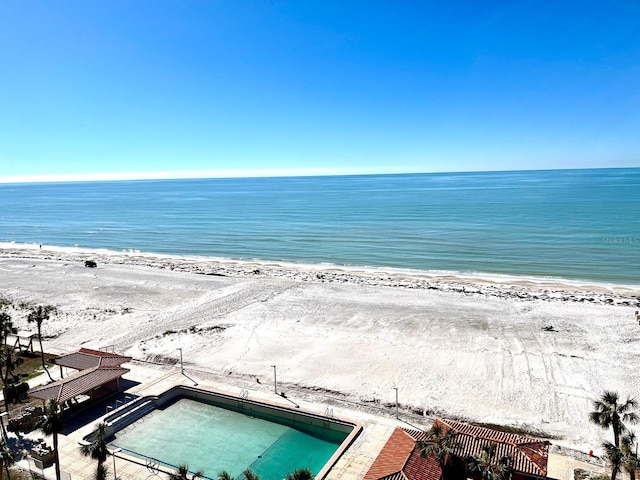 bird's eye view with a view of the beach and a water view