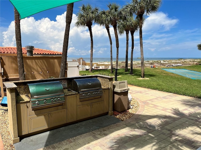 view of patio / terrace with an outdoor kitchen and grilling area