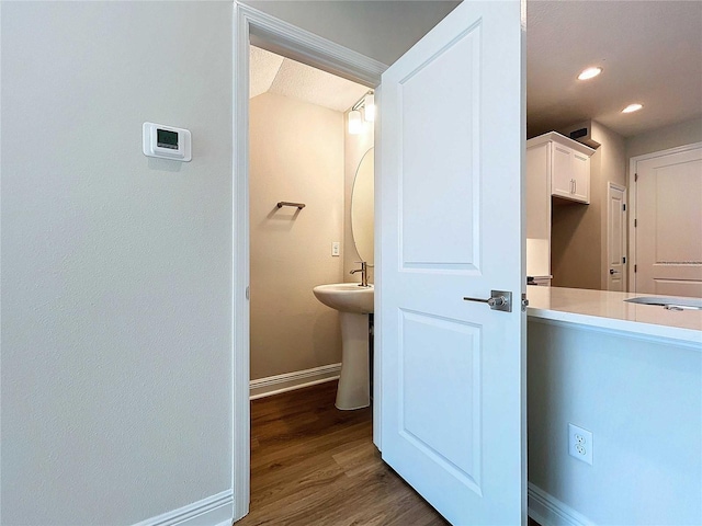 bathroom featuring hardwood / wood-style flooring