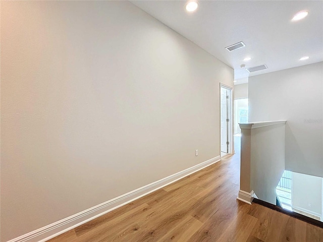 hallway featuring hardwood / wood-style floors