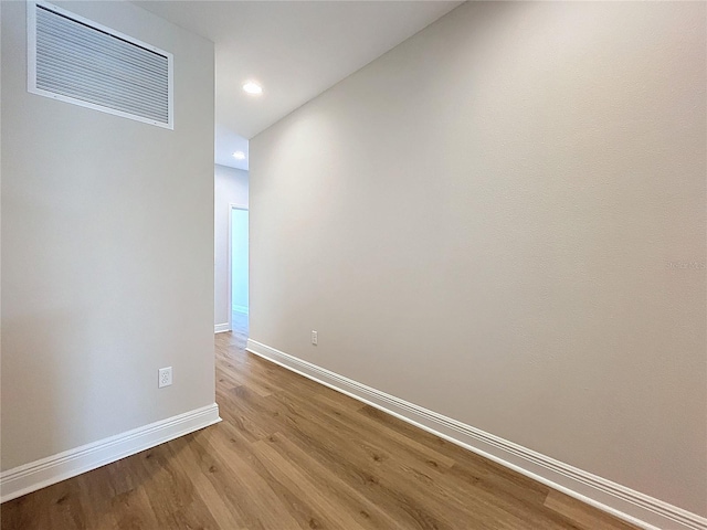 unfurnished room featuring light hardwood / wood-style flooring