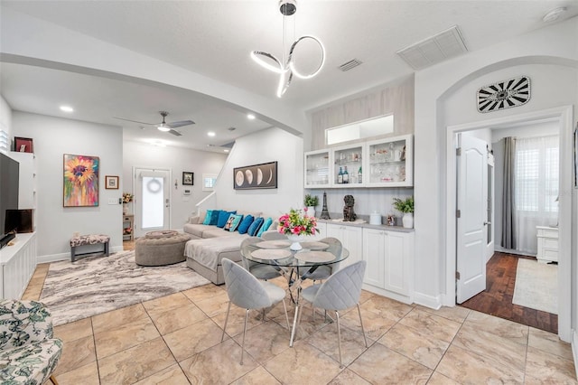 dining area with ceiling fan