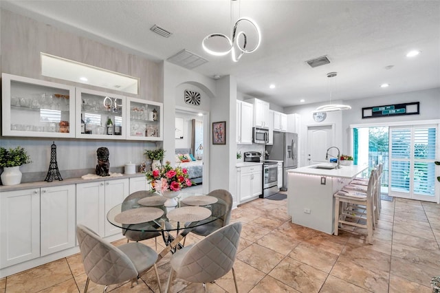 dining area featuring sink