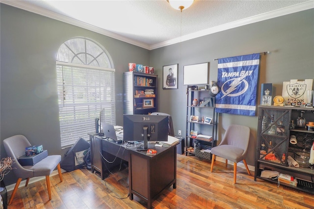 office area with wood-type flooring, a textured ceiling, and crown molding