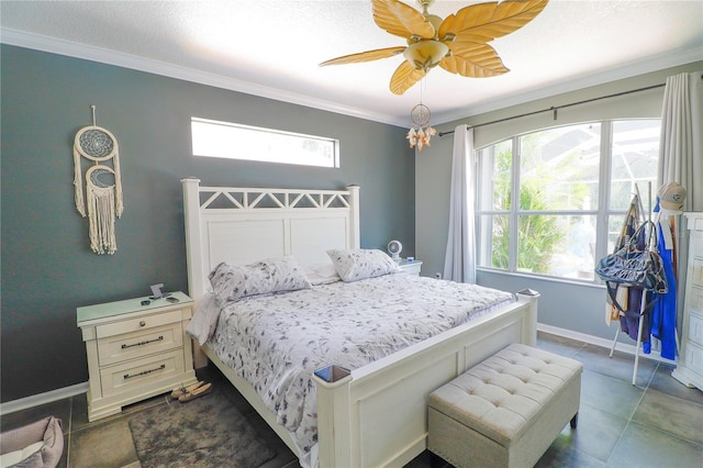 tiled bedroom with ceiling fan and crown molding