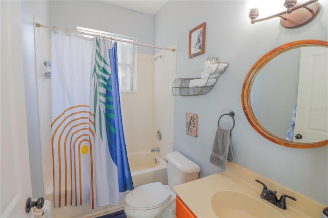 full bathroom featuring vanity, toilet, and shower / tub combo with curtain