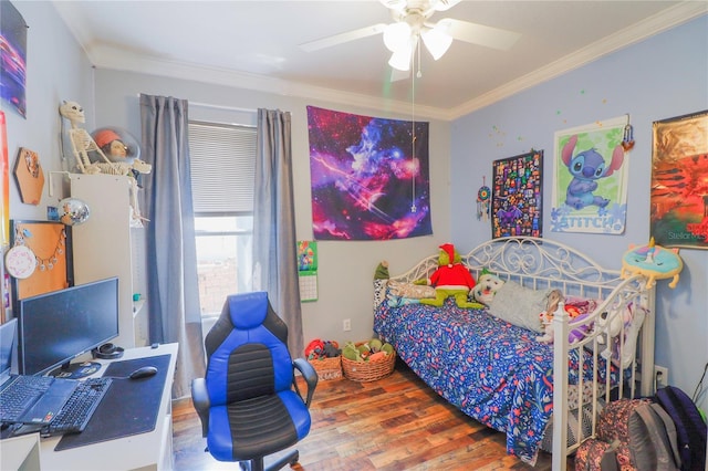 bedroom featuring ceiling fan, hardwood / wood-style flooring, and ornamental molding