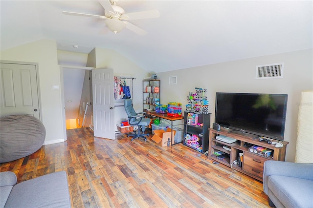 living room with light wood-type flooring, ceiling fan, and lofted ceiling