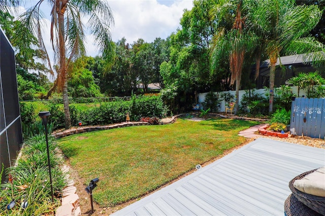 view of yard featuring a lanai