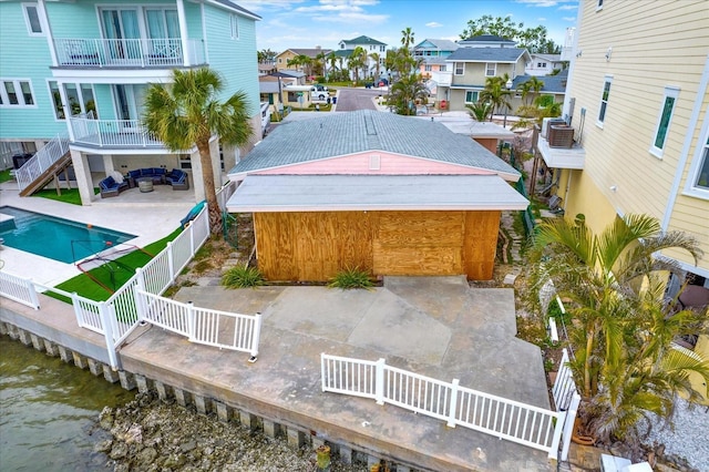 exterior space with a water view