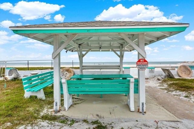 surrounding community featuring a water view