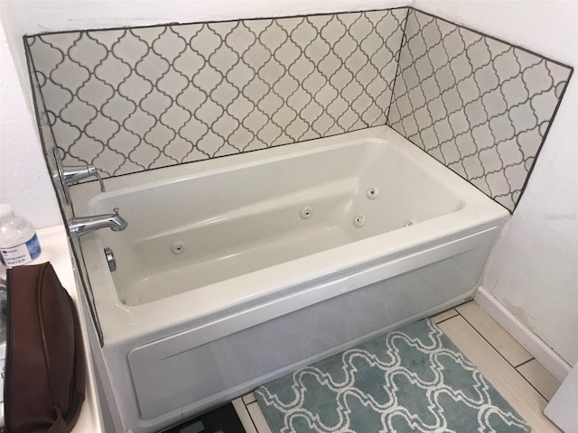 bathroom featuring a tub