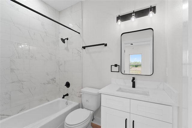 bathroom with toilet, shower / washtub combination, and vanity