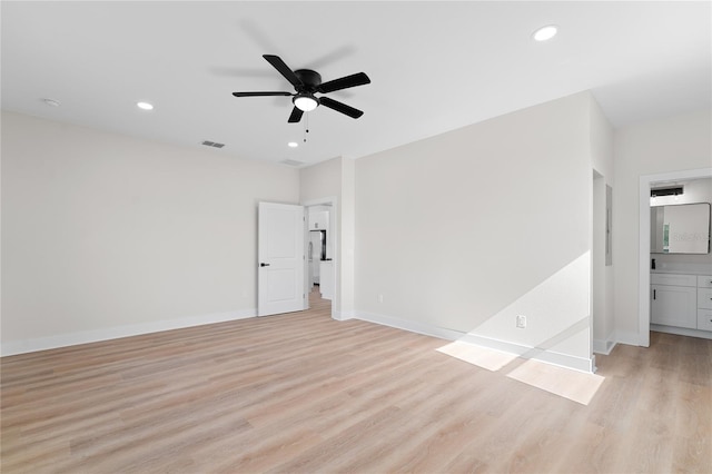 empty room featuring recessed lighting, a ceiling fan, baseboards, visible vents, and light wood-style floors